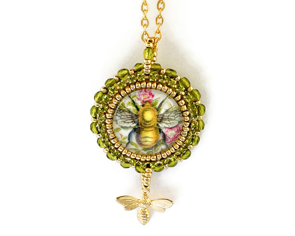 
            
                Load image into Gallery viewer, Beaded Flight of the Bumblebee Green and Gold Pendant Necklace
            
        