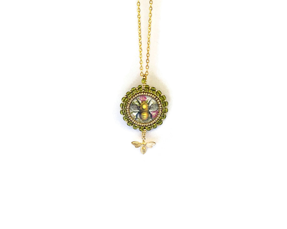 
            
                Load image into Gallery viewer, Beaded Flight of the Bumblebee Green and Gold Pendant Necklace
            
        